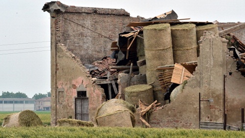 A building in San Felice Sul Panaro is damaged following an earthquake on May 20, 2012 in the Modena province. Panicked people rushed into the streets when a powerful earthquake shook northern Italy early Sunday, killing three people and injuring at least 50.  AFP PHOTO / GIUSEPPE CACACE        (Photo credit should read GIUSEPPE CACACE/AFP/GettyImages)